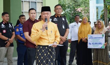 Bupati Rohil Serahkan Santunan BPJS Kepada Almarhum Pegawai Satpol PP