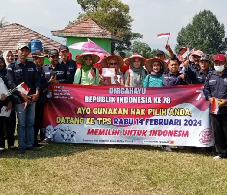 PPK dan PPS Kecamatan Air Naningan Gelar Sosialisasi Pemilu di Karnaval HUT RI ke-78