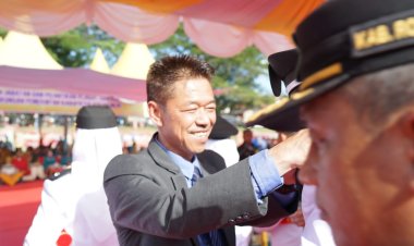 Lantik Penjabat Kepenghuluan, Bupati Rohil : Perangkat Desa Tak Boleh Sombong