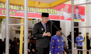 Jadi Inspektur Upacara Harkitnas, Bupati Rohil Sampaikan Amanat Menteri Kominfo RI