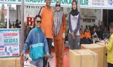 Gelar Jalan Santai Meriahkan HUT ke-25, Plt. Bupati Rohil Ajak Warga Atasi Banjir