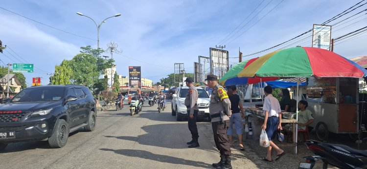 Polsek Bagan Sinembah Atur Lalin di Depan Pasar Tumpah