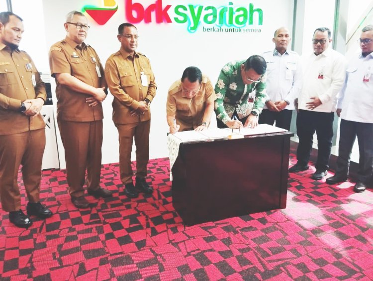 Bupati Rohil Teken MoU Layanan Keuangan ASN Berbasis Syariah