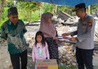 Kapolsek Siak Hulu Salurkan Bantuan untuk Korban Kebakaran di Desa Pangkalan Baru