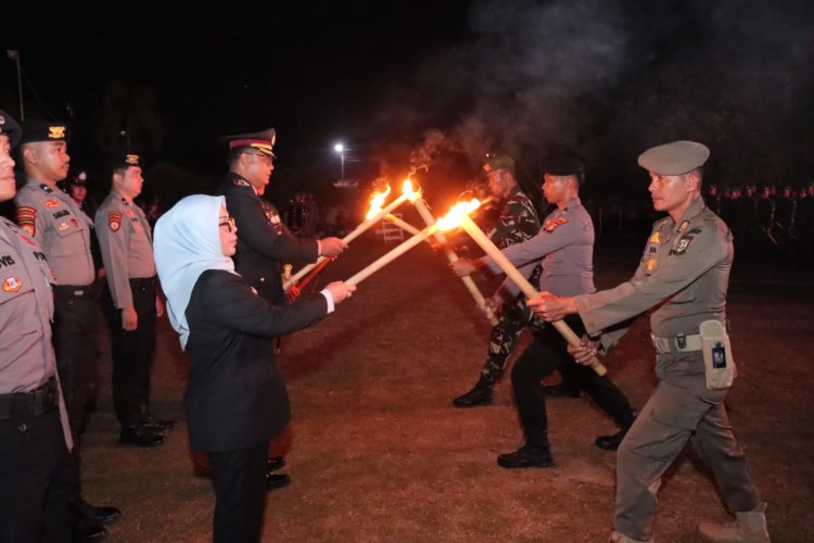 Kapolres Kampar Pimpin Upacara Taptu, Obor Kemerdekaan Menyala di Bangkinang